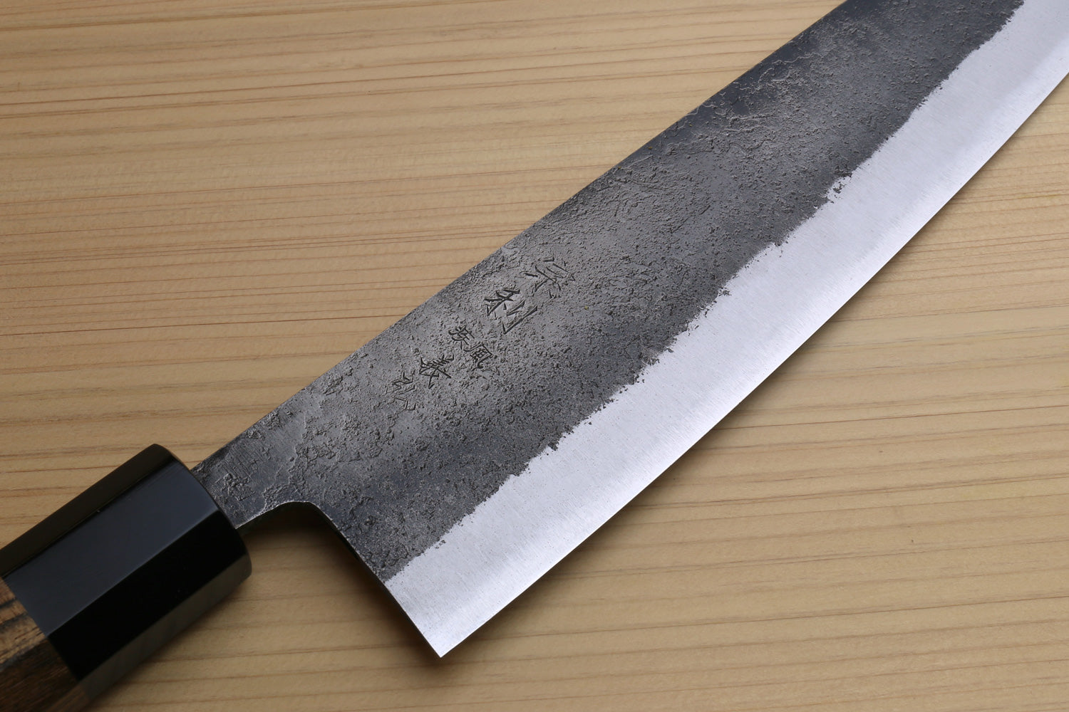 Japanese gyuto chef knife with white steel blade and dark cocobolo wood handle