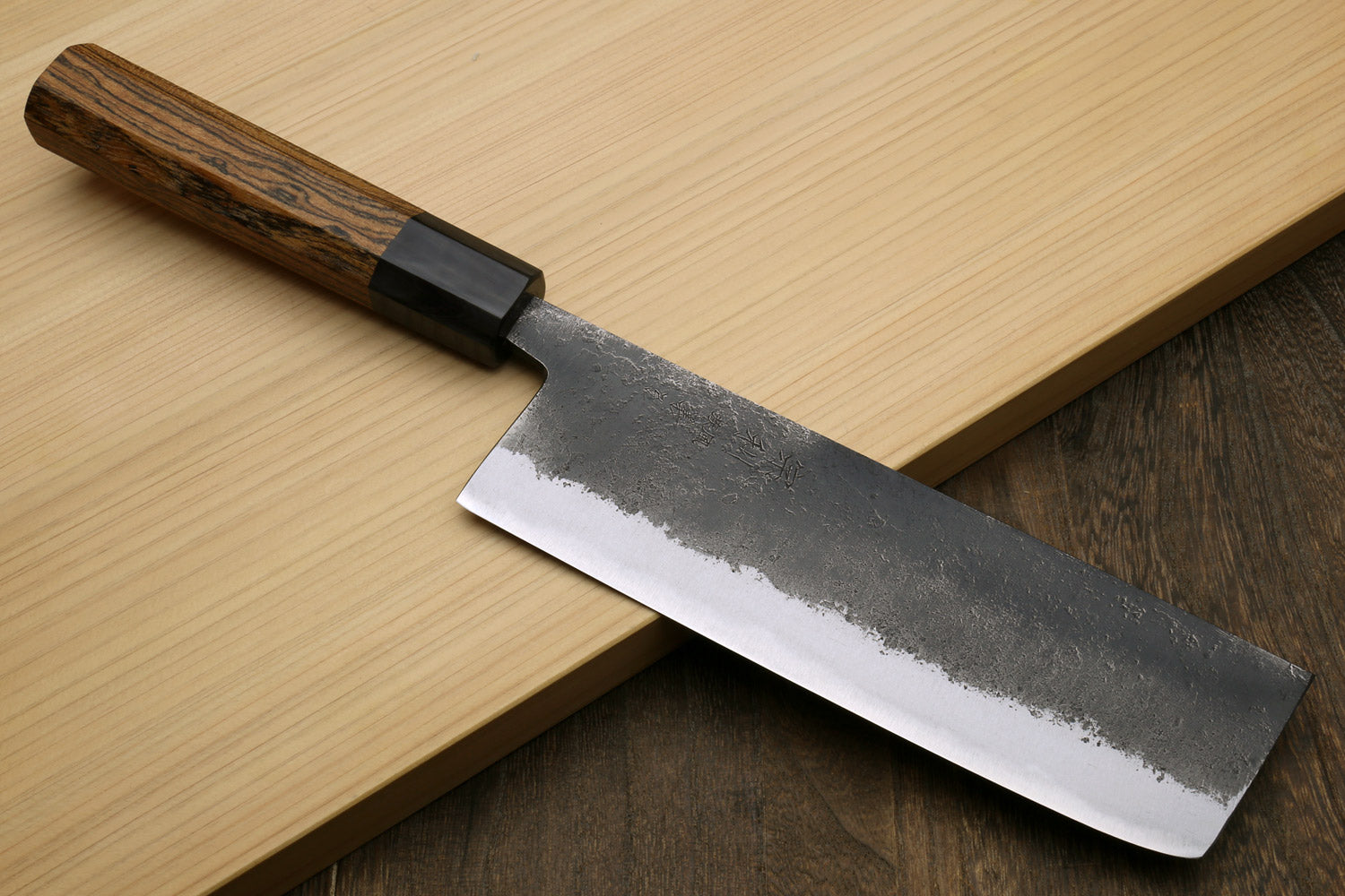 Japanese nakiri vegetable knife with dark cocobolo handle and silver steel blade edge