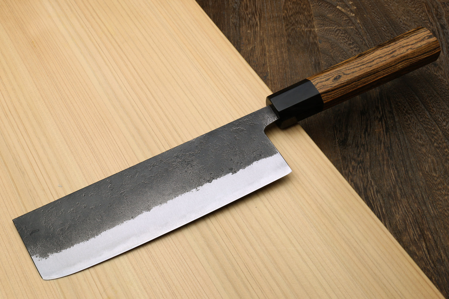 Japanese nakiri vegetable knife with cocobolo handle and wide steel blade with textured finish