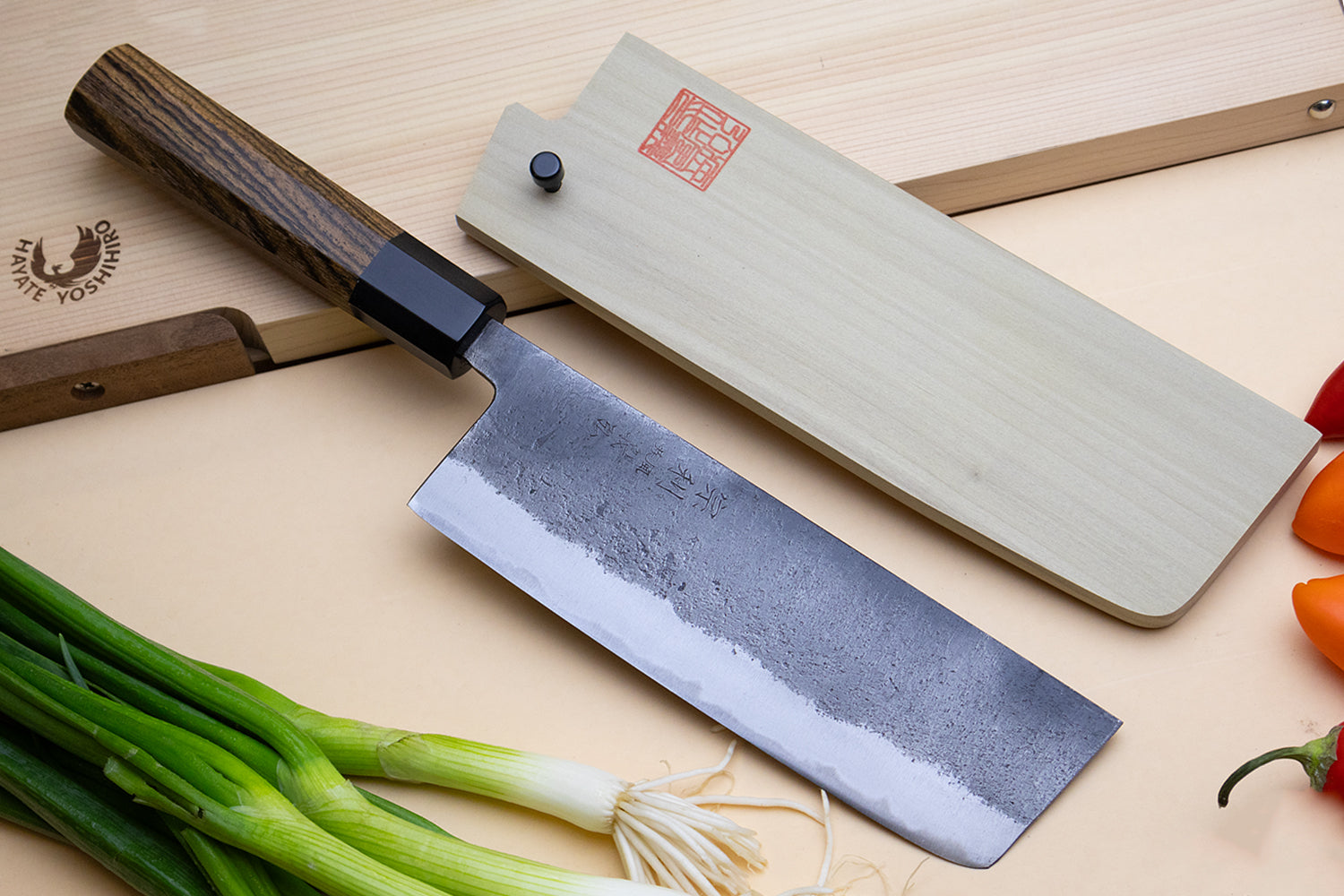Japanese nakiri knife with cocobolo handle and silver steel blade with speckled finish