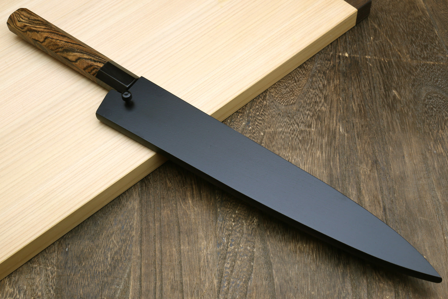Japanese slicer knife with white-steel blade, cocobolo handle, and black saya