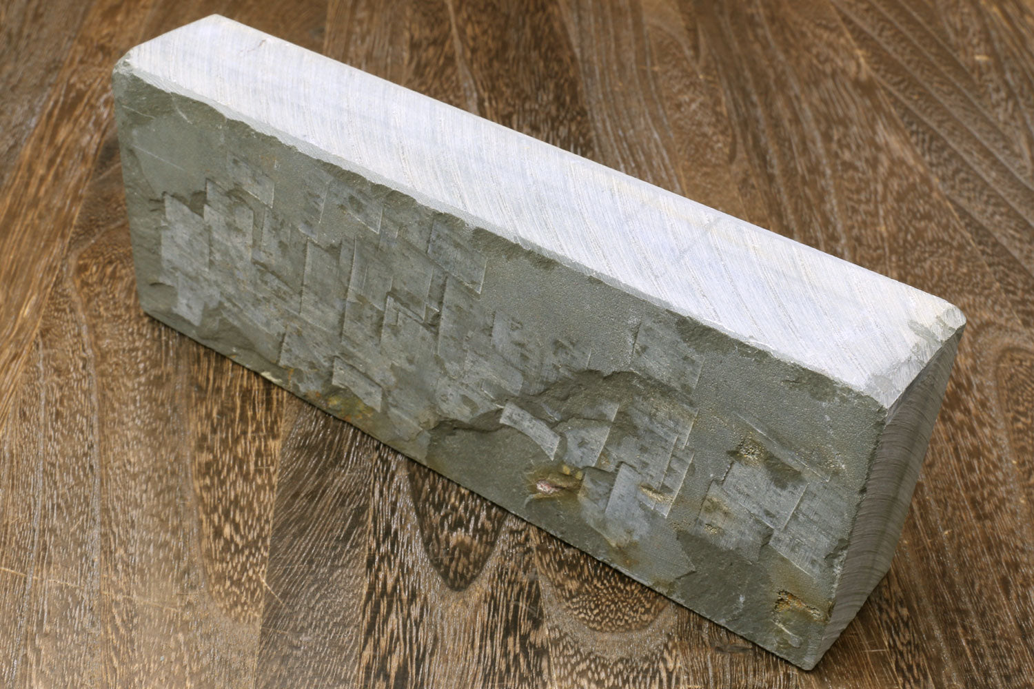 Natural sharpening whetstone, rectangular gray stone with white top surface