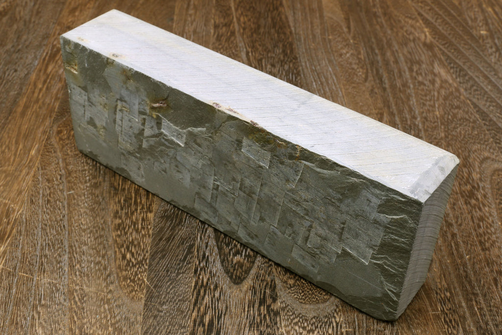 Natural sharpening whetstone, rectangular gray stone with light white edge