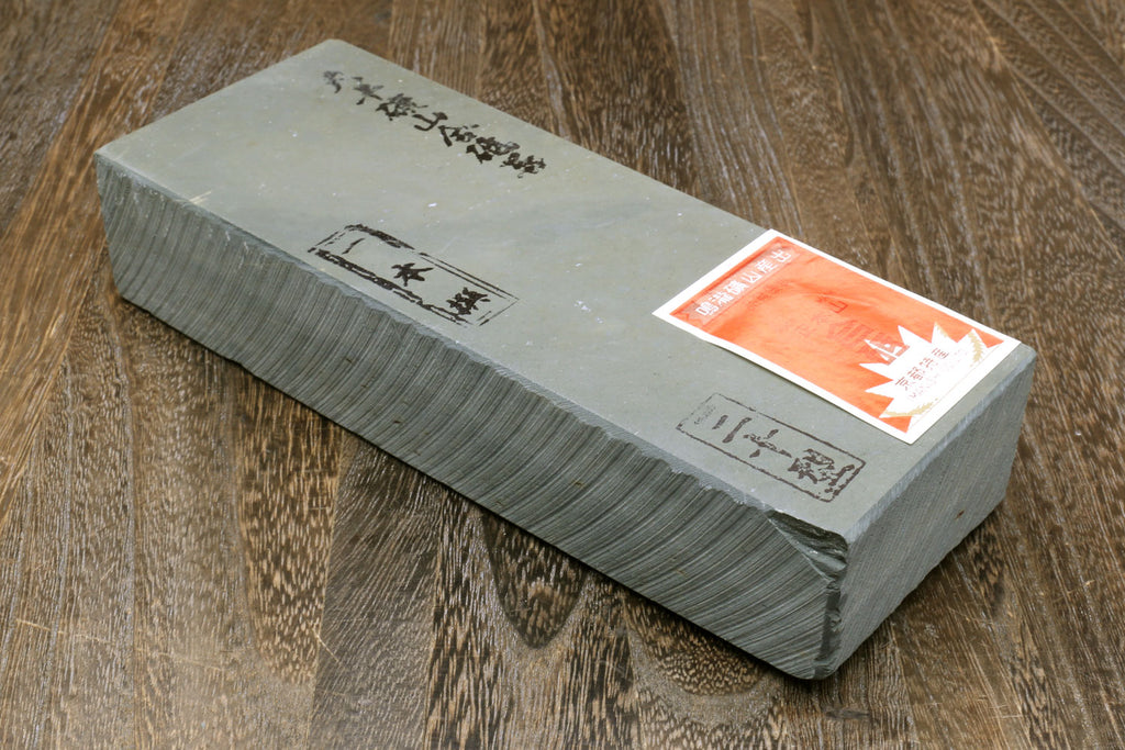Yoshihiro natural sharpening whetstone, gray rectangular finishing stone with labels
