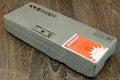 Natural whetstone, gray rectangular block with Japanese text and orange sticker
