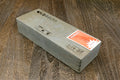 Natural whetstone block with orange label and calligraphy text on top face