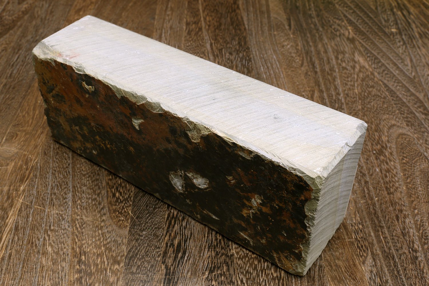 Natural sharpening whetstone, rectangular block, light top with dark side