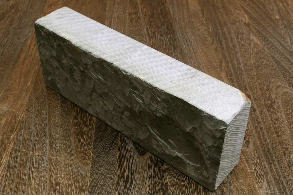 Natural sharpening whetstone block, long green-gray stone with light top edge