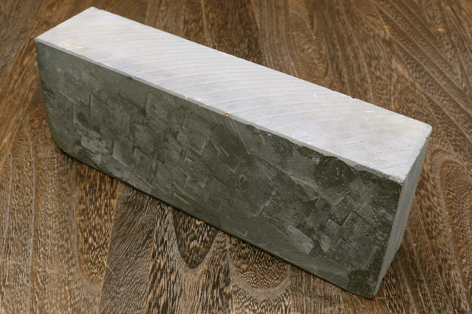 Yoshihiro natural finishing whetstone, dark gray-green rectangular stone side view