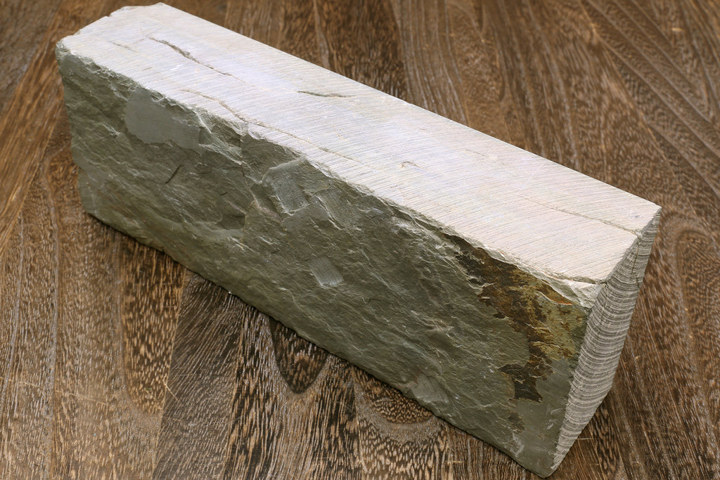 Natural sharpening whetstone finishing block with white surface and gray side