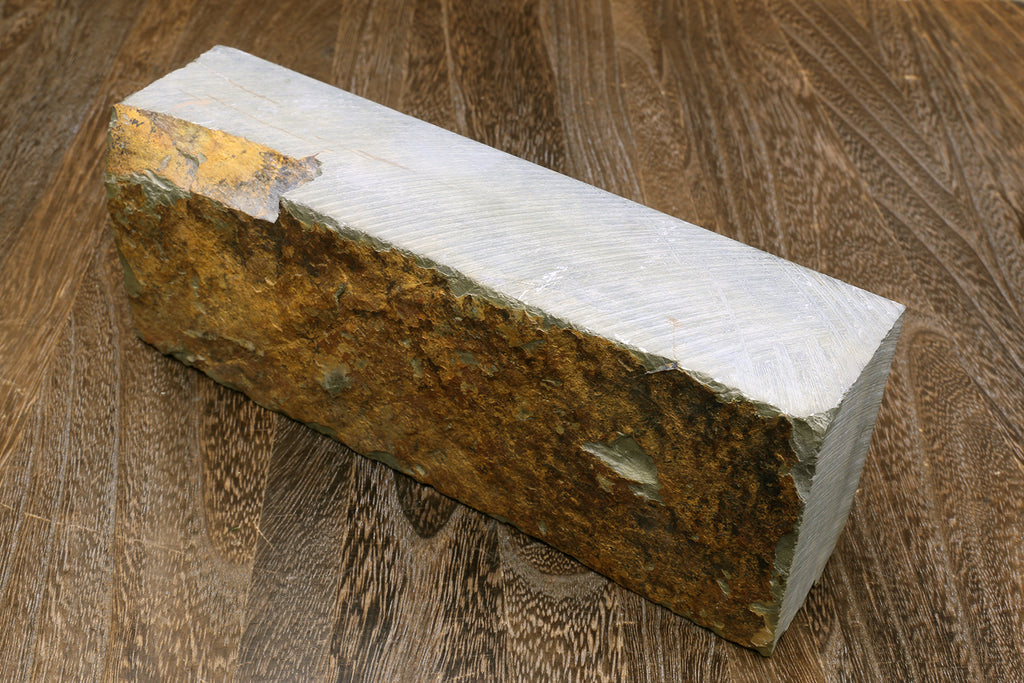 Natural whetstone block, white top with brown sides and rough edges