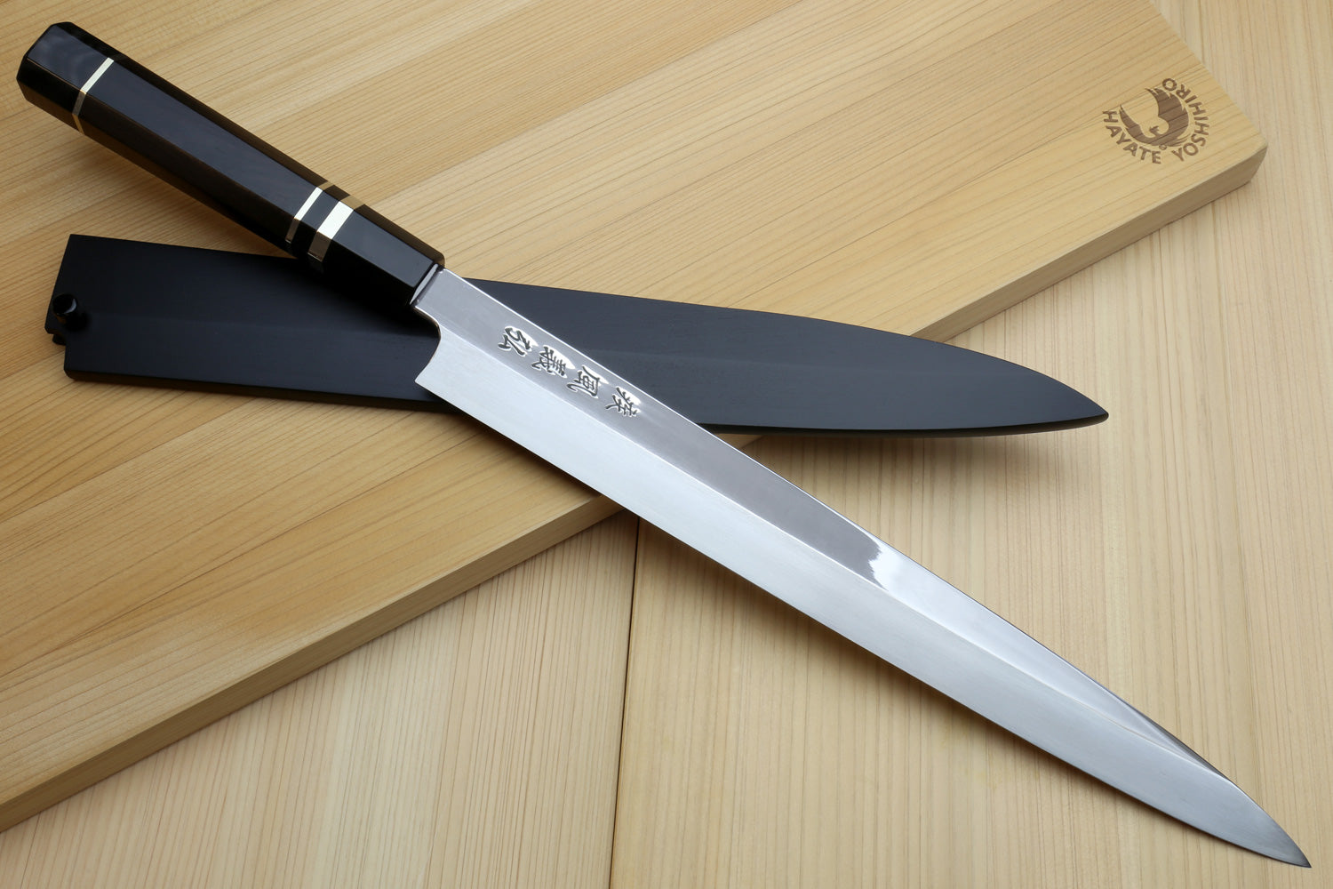 Yoshihiro yanagi sushi knife with mirror-finished steel blade and ebony handle