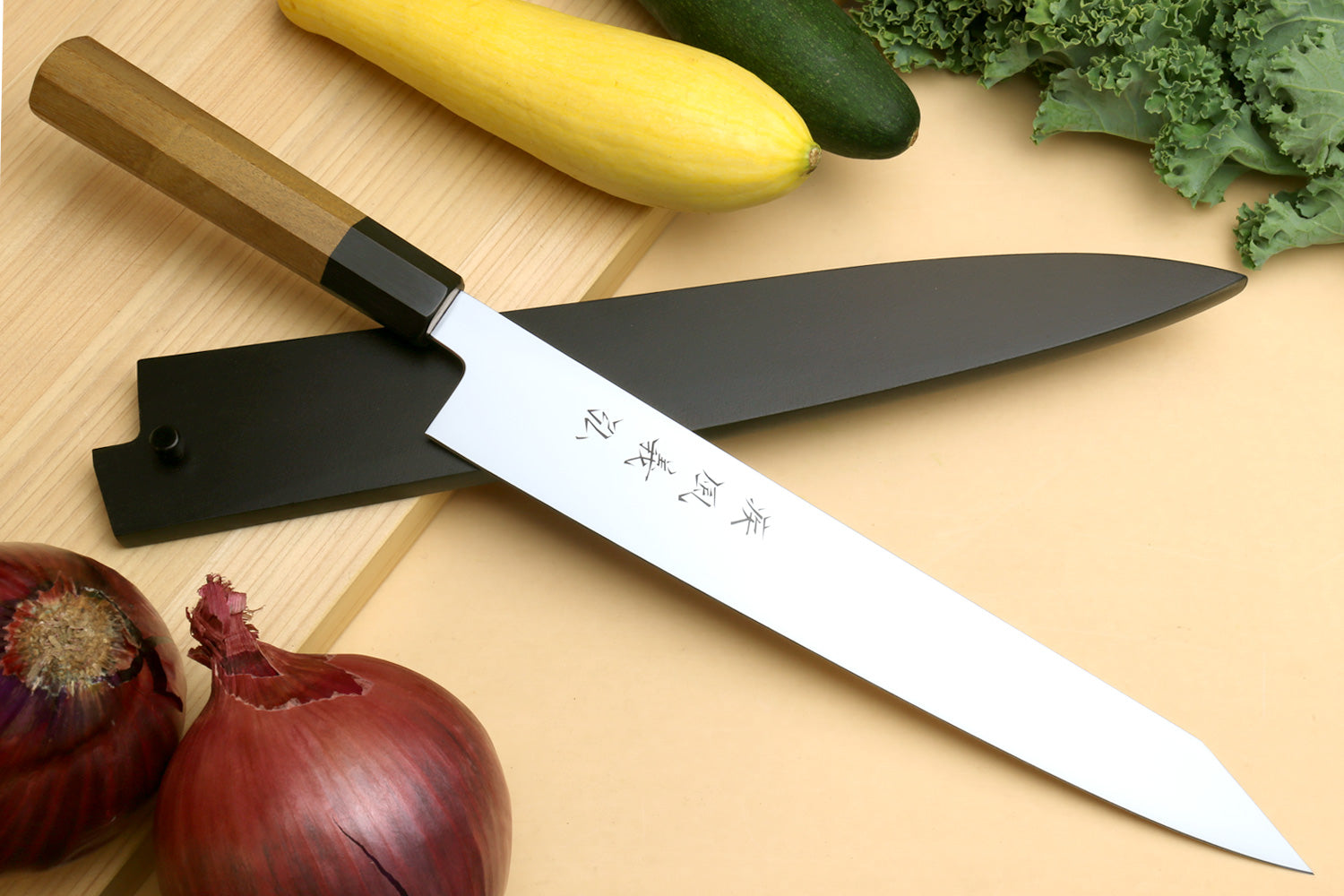 Japanese slicer knife with silver sujihiki-style blade and black handle spacer
