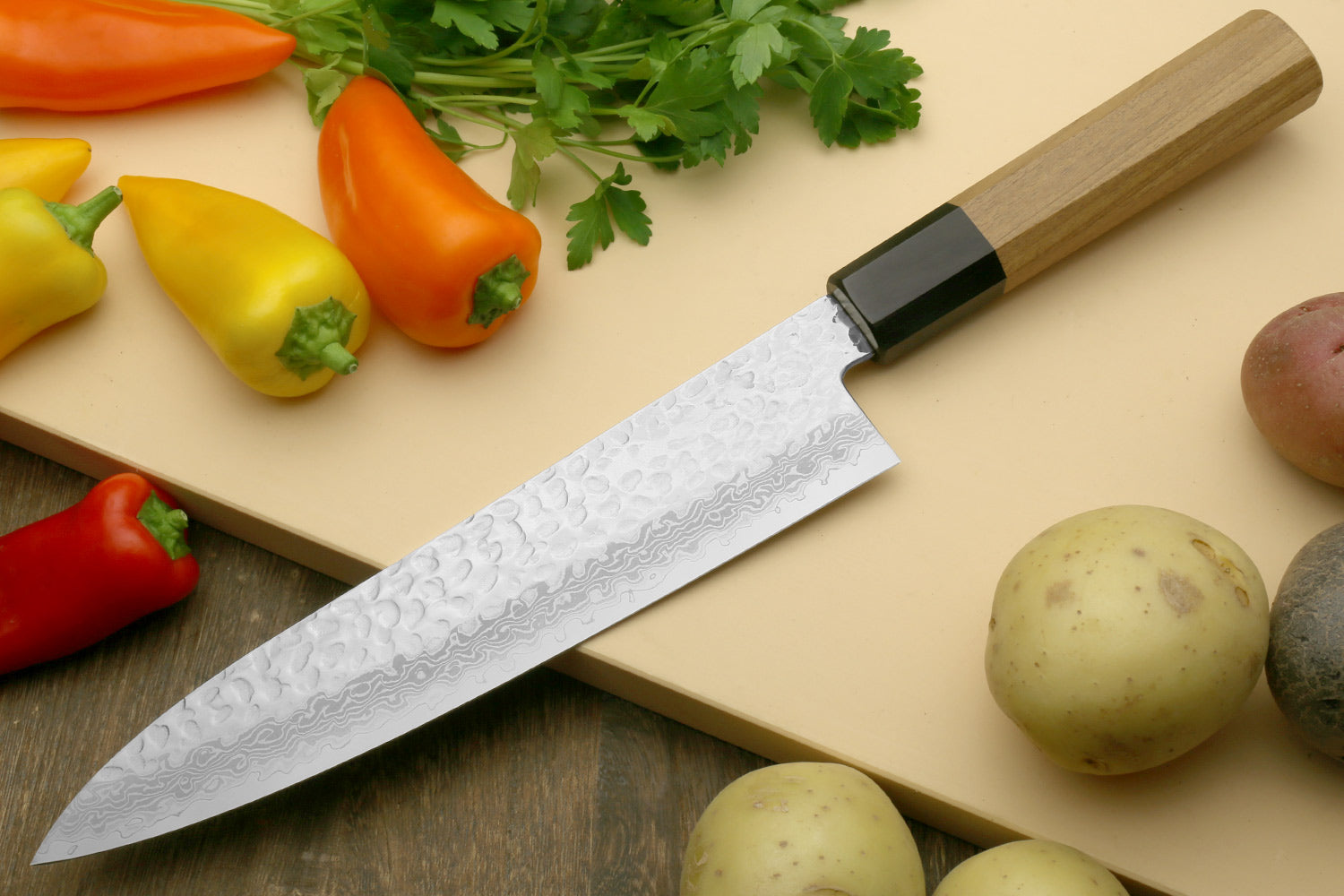 Damascus gyuto chef's knife with light octagonal handle and black bolster
