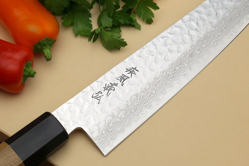 Damascus gyuto chef's knife with black bolster and engraved blade surface