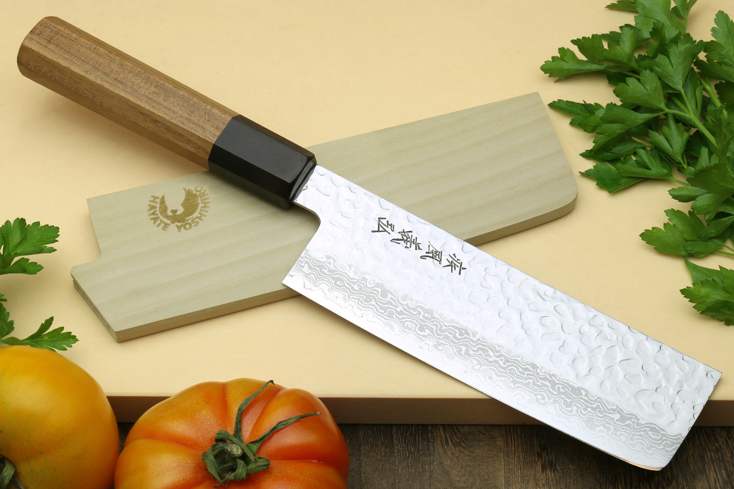 Nakiri vegetable knife with hammered Damascus blade, wooden handle and black end cap