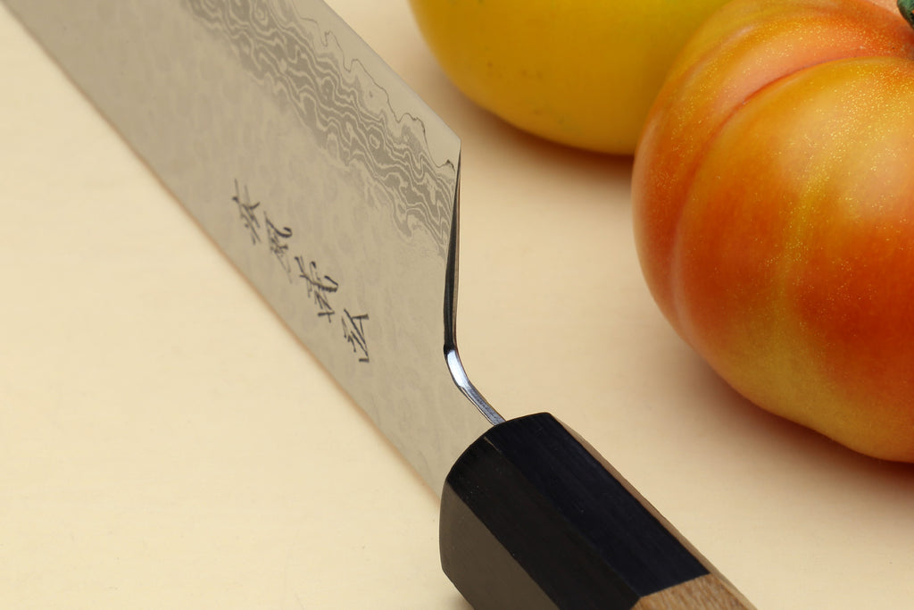 Nakiri vegetable knife with angled cutting edge, hammered Damascus steel, wood handle