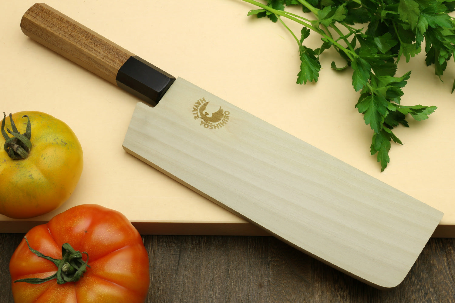 Nakiri vegetable knife with hammered Damascus blade, wooden handle and black end cap