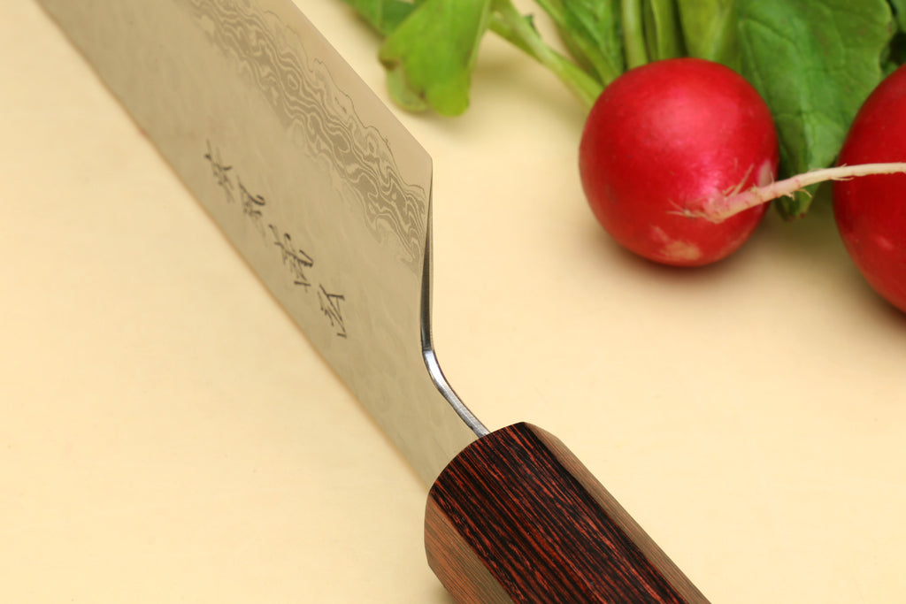 Nakiri vegetable knife close-up of Damascus blade engraving and rosewood handle