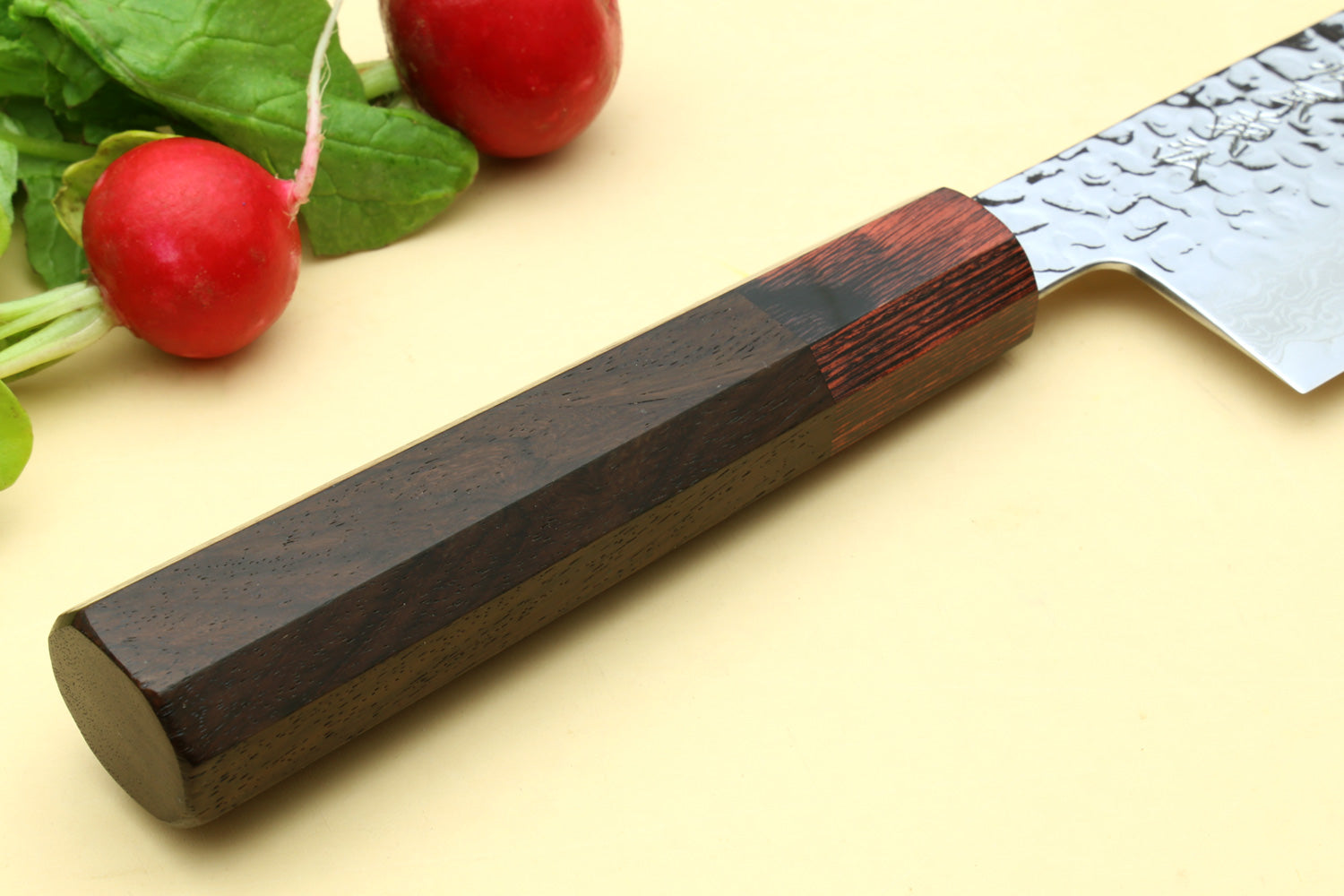 Nakiri vegetable knife with dark rosewood handle and hammered Damascus blade