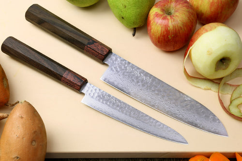 Damascus santoku and petty knives with rosewood handles and hammered blades
