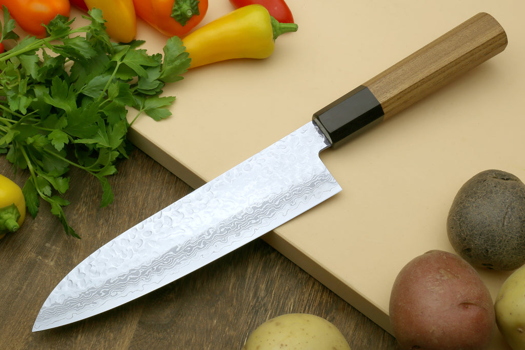 Damascus Santoku chef knife with octagonal wooden handle and black collar