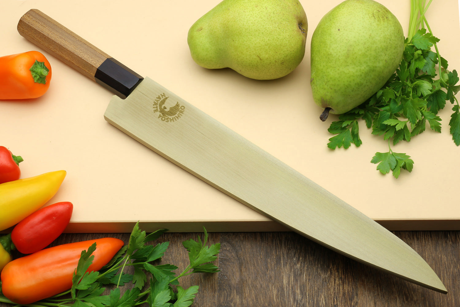 Yoshihiro sujihiki slicer knife with light Damascus blade and octagonal wood handle