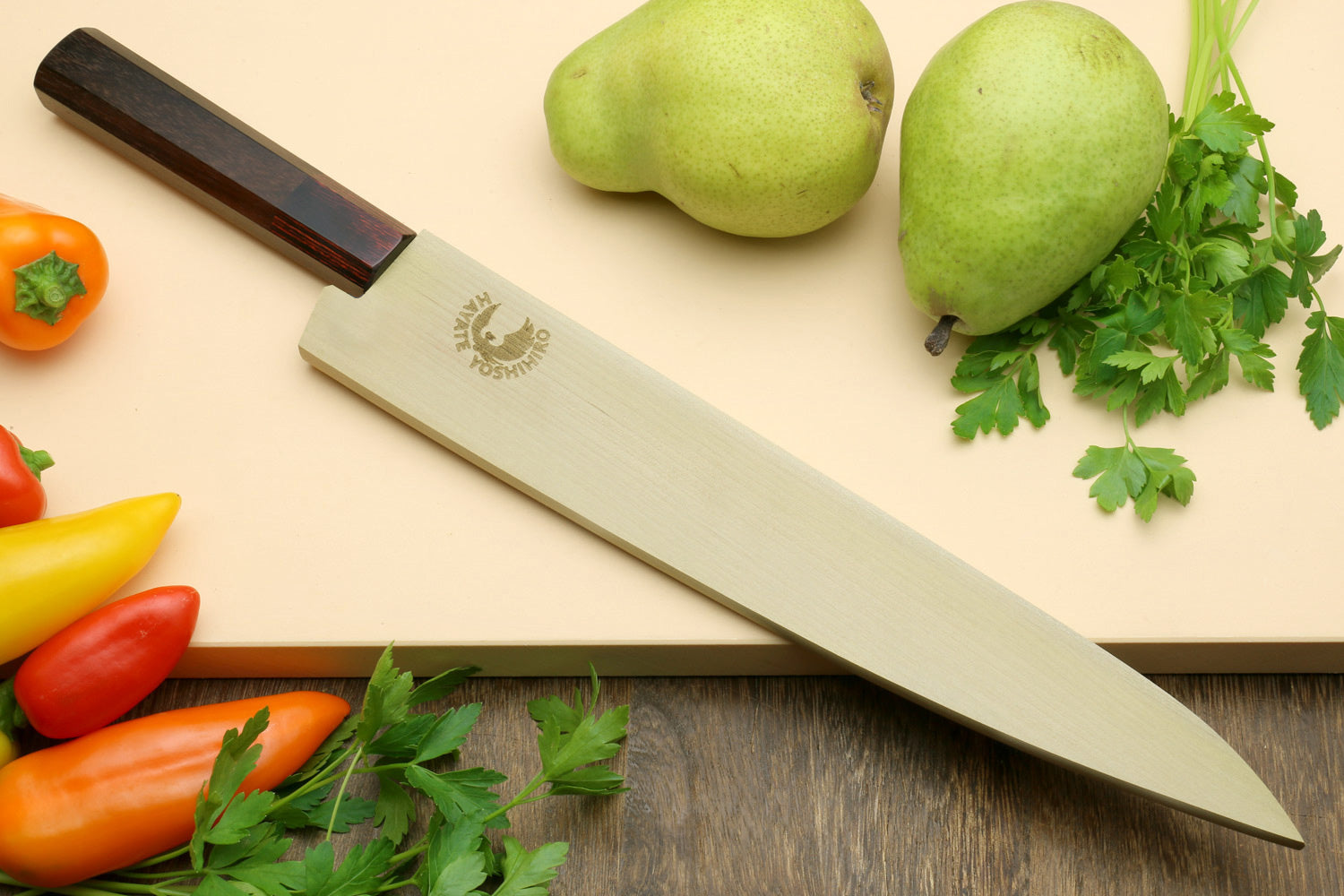 Japanese sujihiki slicer knife, hammered Damascus blade and dark rosewood octagonal handle