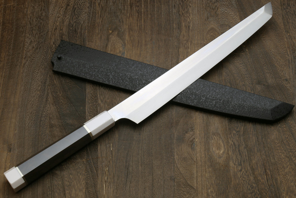 Japanese sushi sashimi knife angled view with dark blade and ebony handle with silver rings