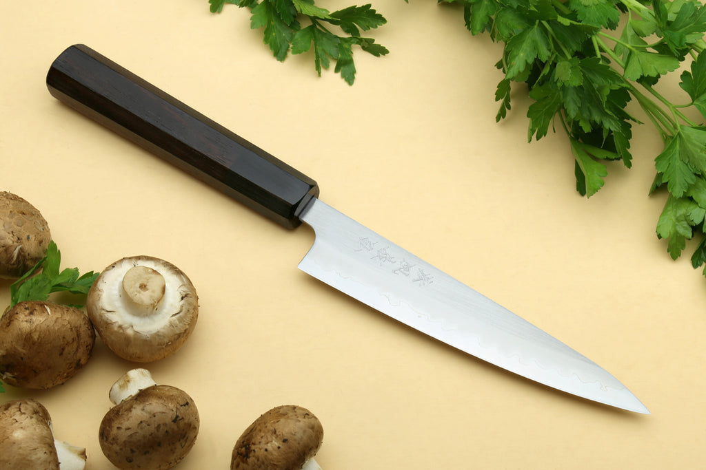 Stainless clad petty utility knife with light silver blade and dark handle