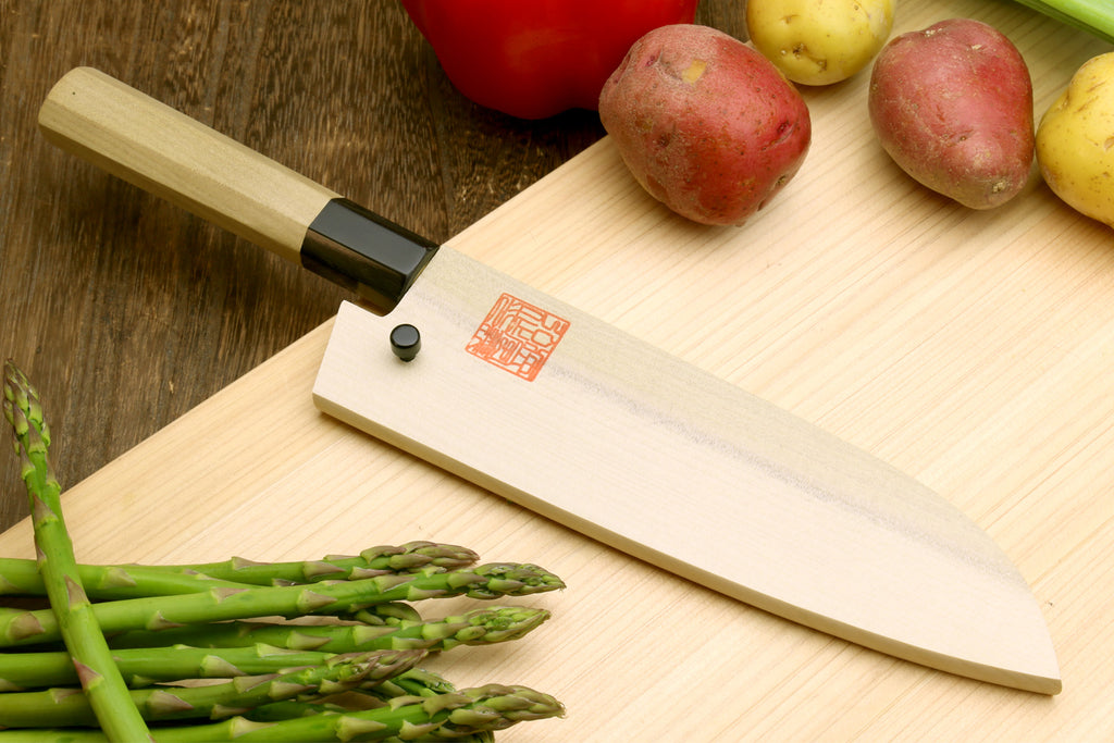 Magnolia wood-handled stainless santoku knife with dark bolster and engraved blade