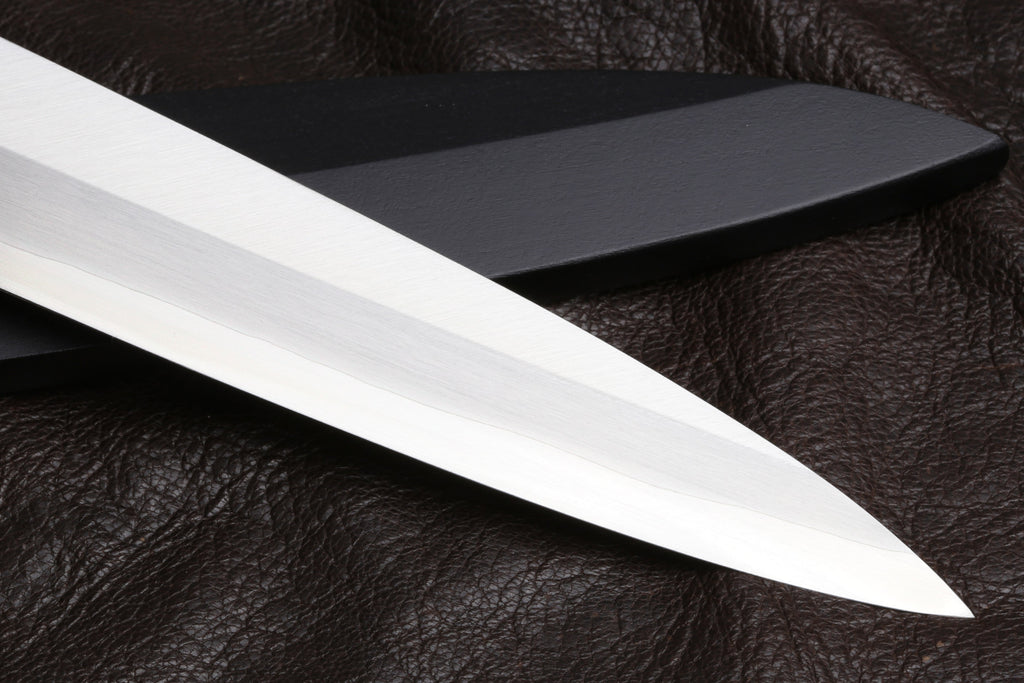 Yanagi sushi knife blade close-up with stainless steel edge