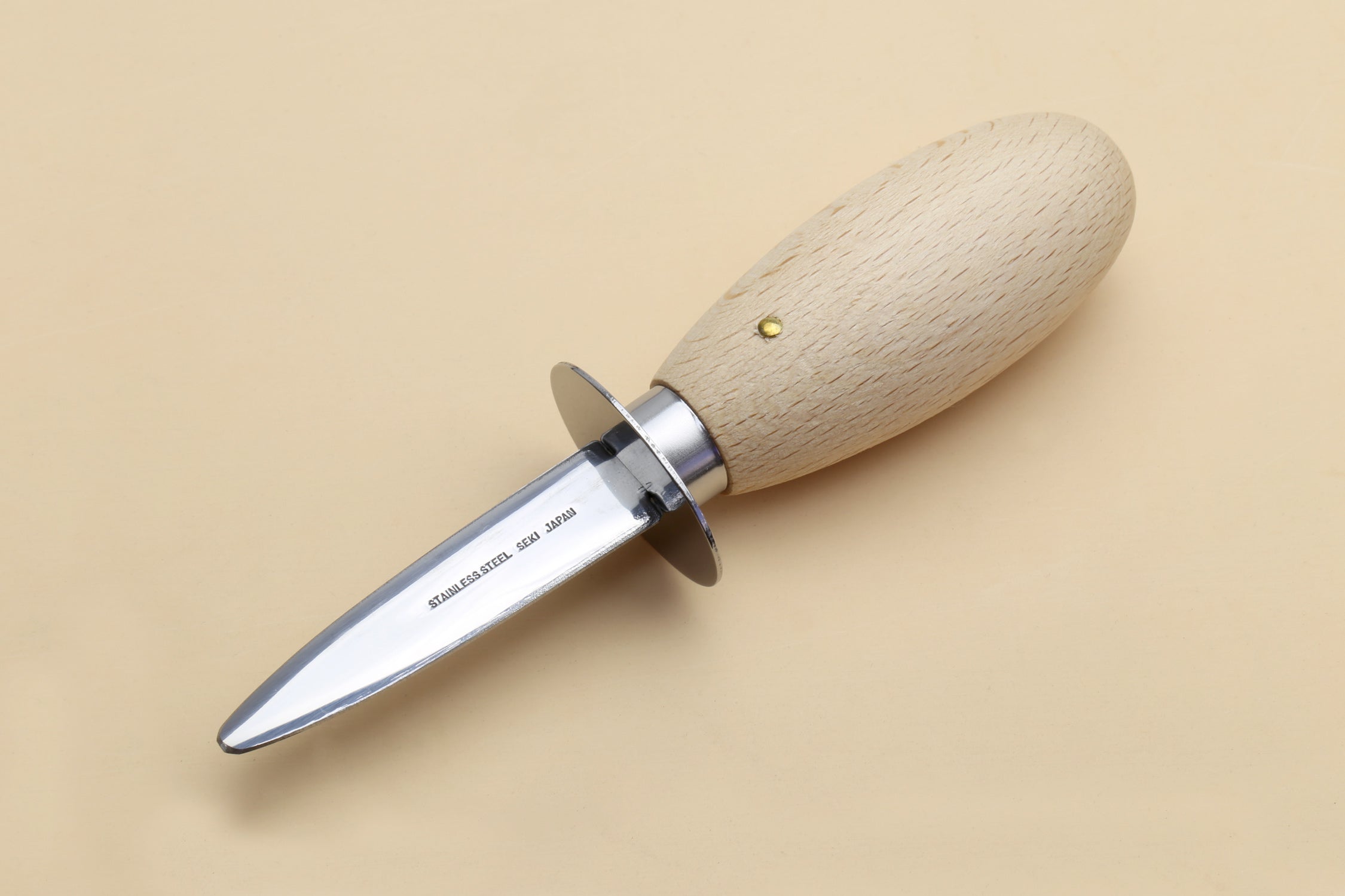Stainless clam and oyster knife with light wood handle and pointed steel blade