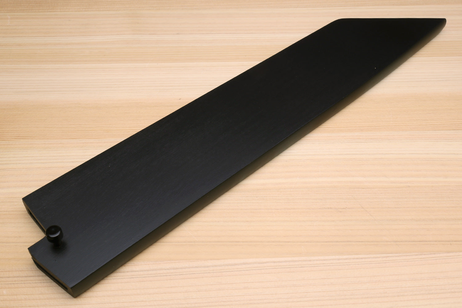 Lacquered wooden saya cover with pointed tip and raised heel guard, dark finish