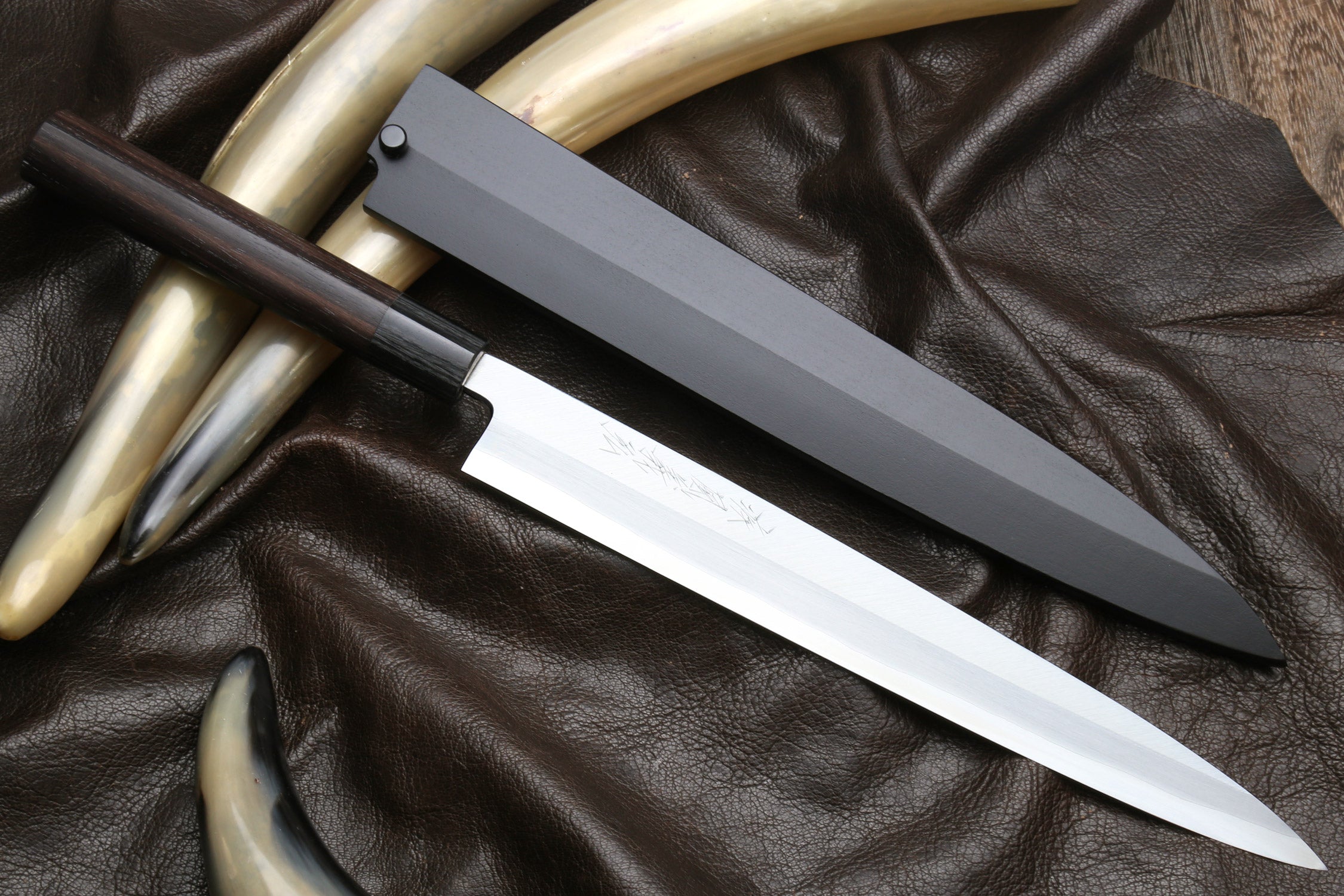 Yanagi sushi knife with stainless steel blade and dark rosewood handle
