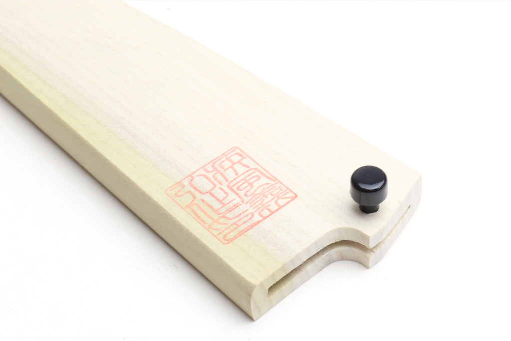 Natural magnolia wood saya cover, black knob and red logo stamp on end grip