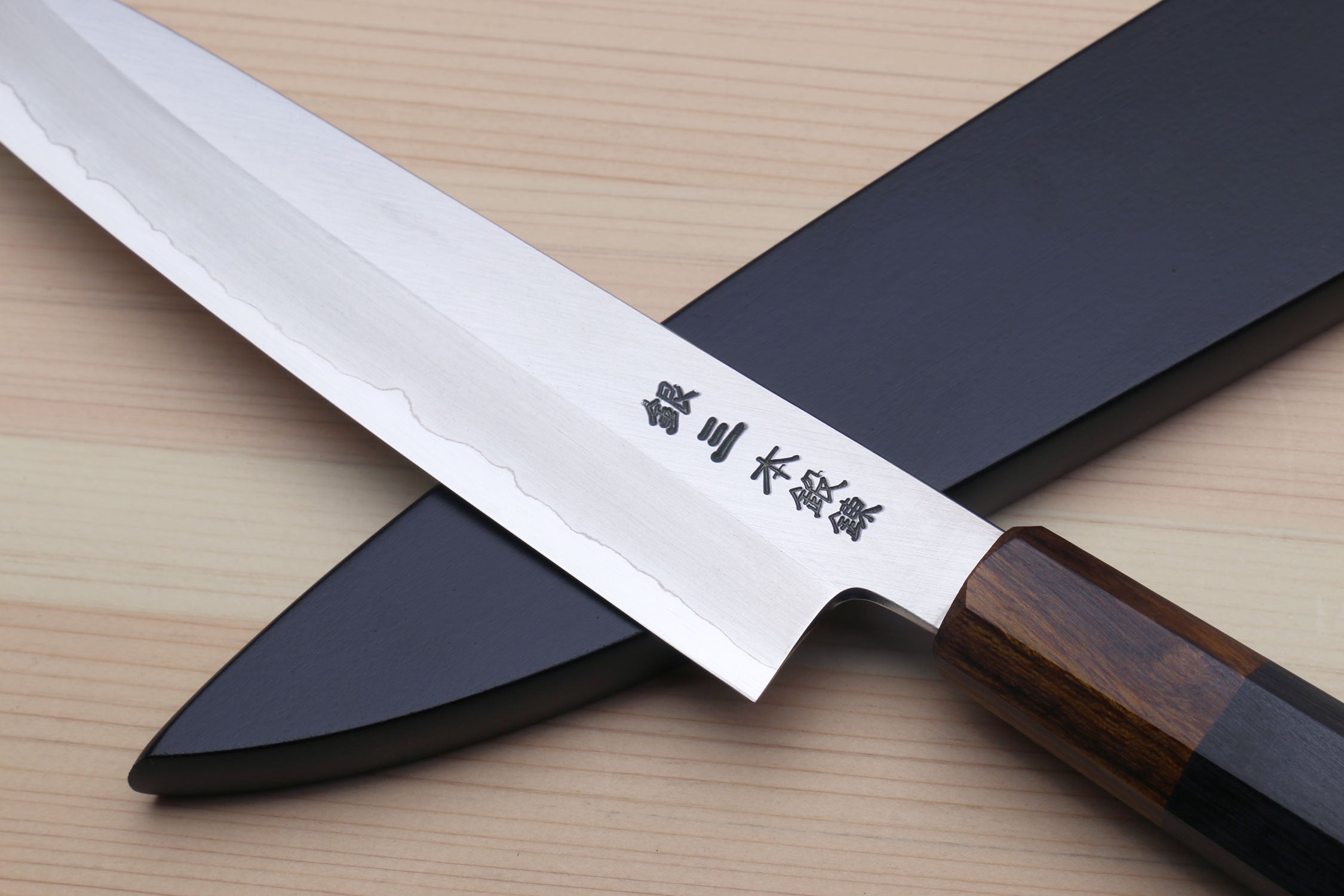 Petty utility knife with stainless blade and dark ebony handle, black saya cover