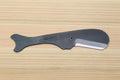 Utility knife with dark handle and silver blade, whale-shaped profile