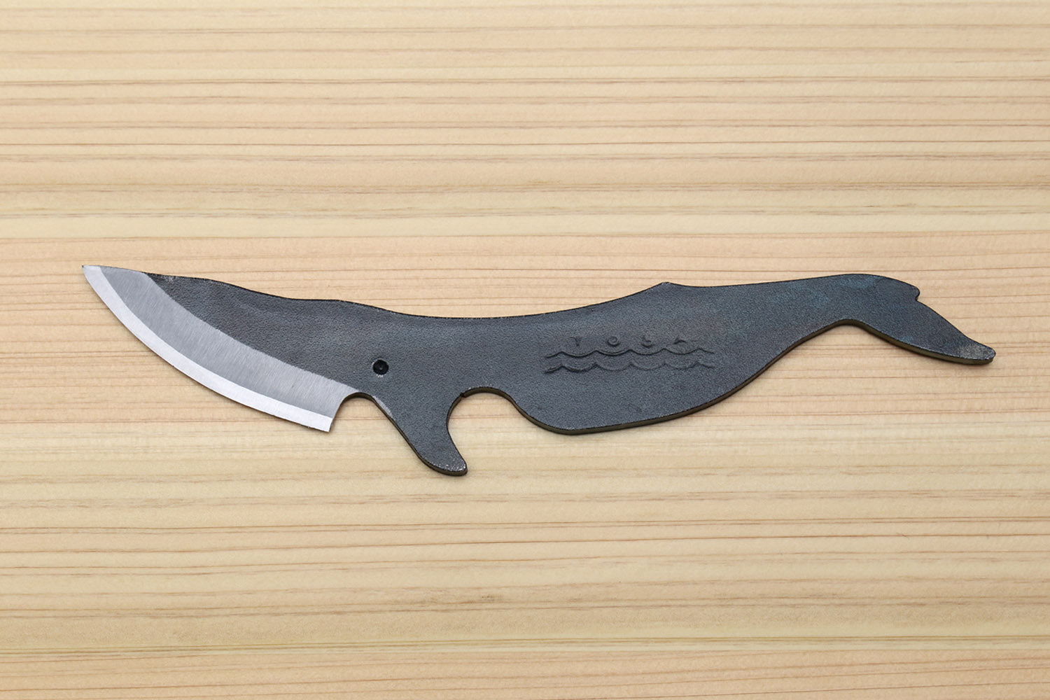 Whale utility knife with blue-gray body and silver edge, full-length