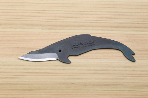 Whale utility knife with wave etching on the handle and short curved silver blade