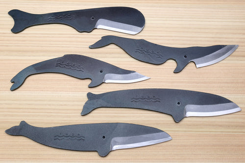Five-piece utility knife set with dark kurouchi finish, whale pattern, and silver blades