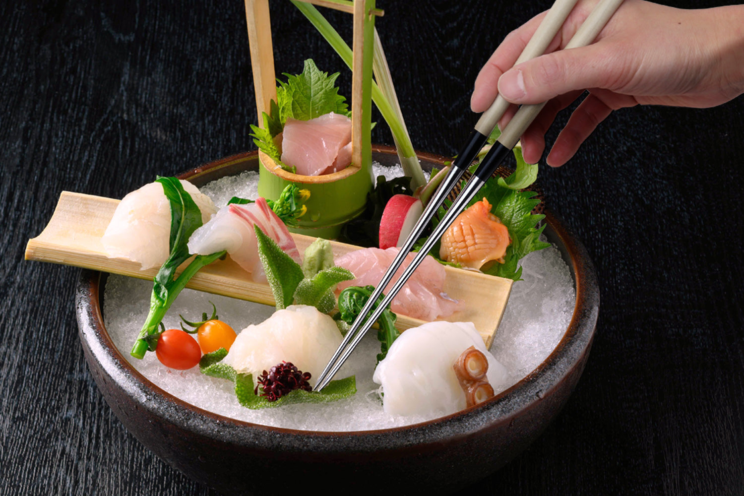 Sushi plating tweezers with light wood handles, stainless tips, and black grip rings