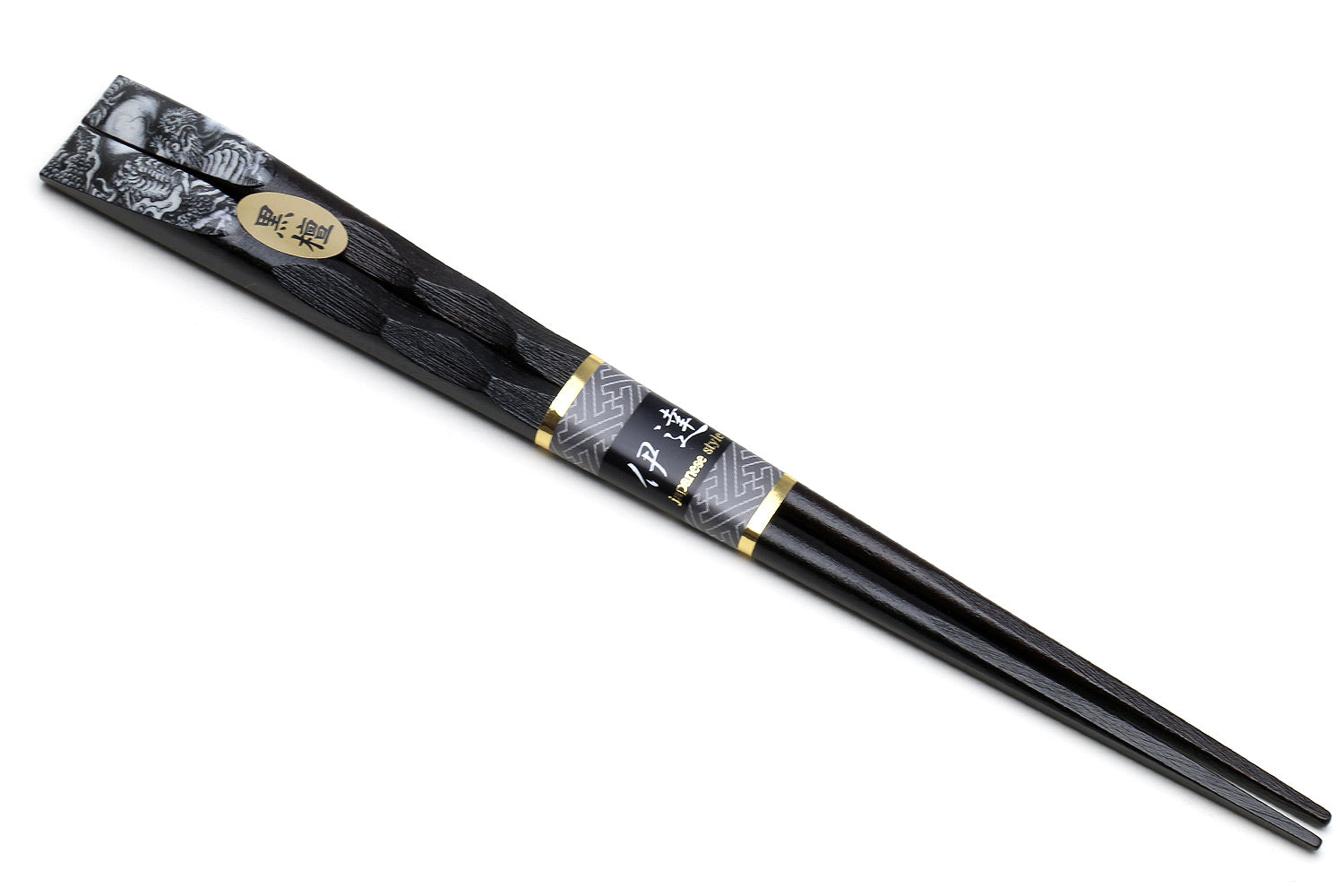 Japanese black chopsticks with dragon motif near tips