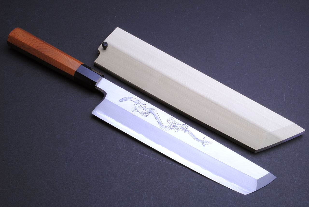 Japanese eel bone slicer knife with engraved blade and yew wood handle.