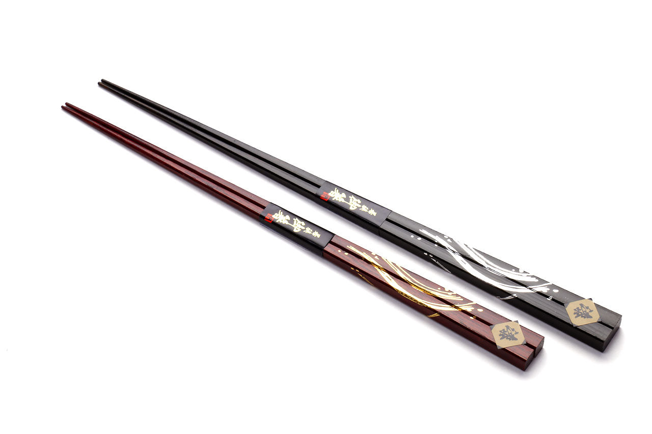 Lacquered Japanese chopsticks set, red and black with gold and floral accents