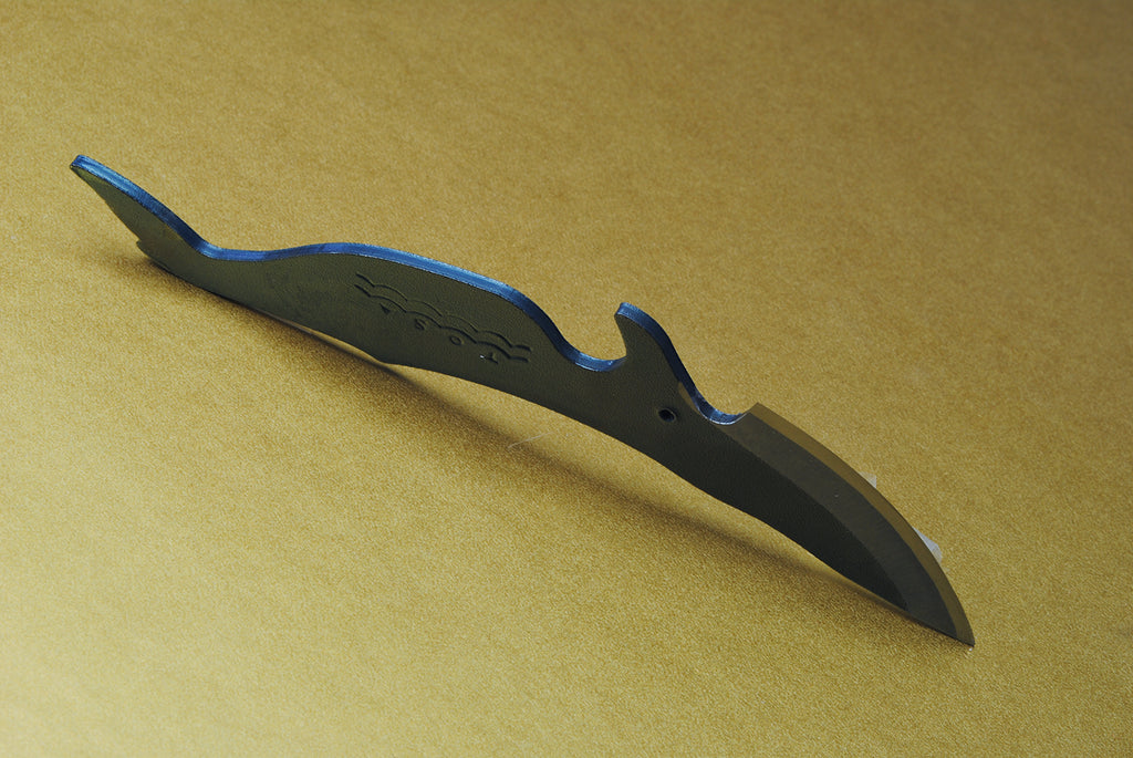 Whale-shaped utility knife with dark handle and curved black-finished blade