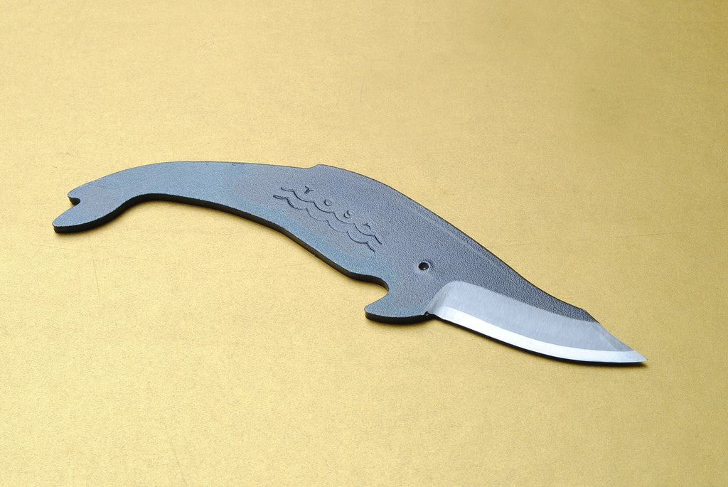 Whale-shaped utility knife with dark kurouchi handle and silver cutting edge