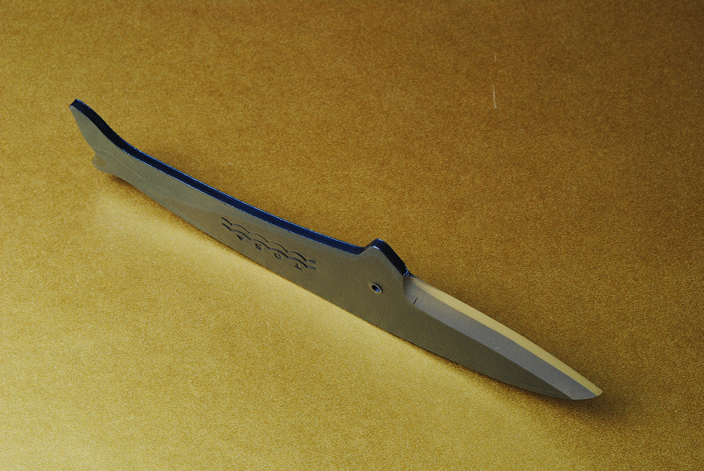 Japanese utility knife with dark blue whale handle and silver blade, etched side