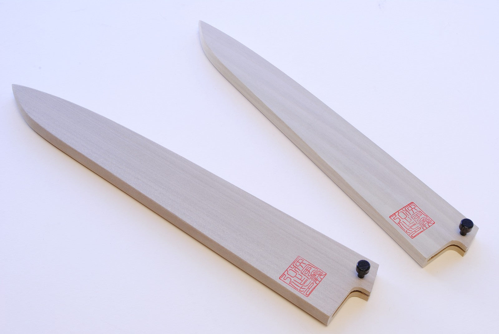 Pair of natural magnolia wood saya blade protectors for slicer knives, black end caps