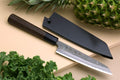 Petty utility knife with kurouchi steel blade and dark shitan handle, in a sheath.